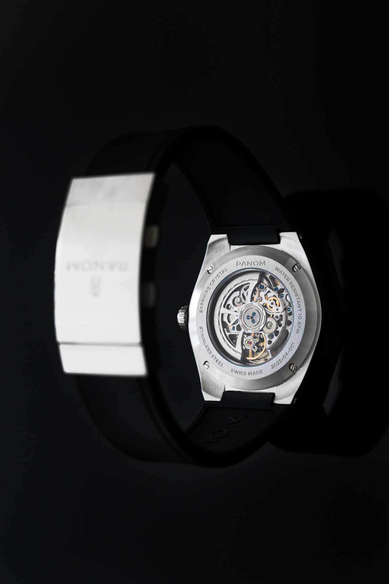 TheHive open sapphire caseback and automatic movement in profile