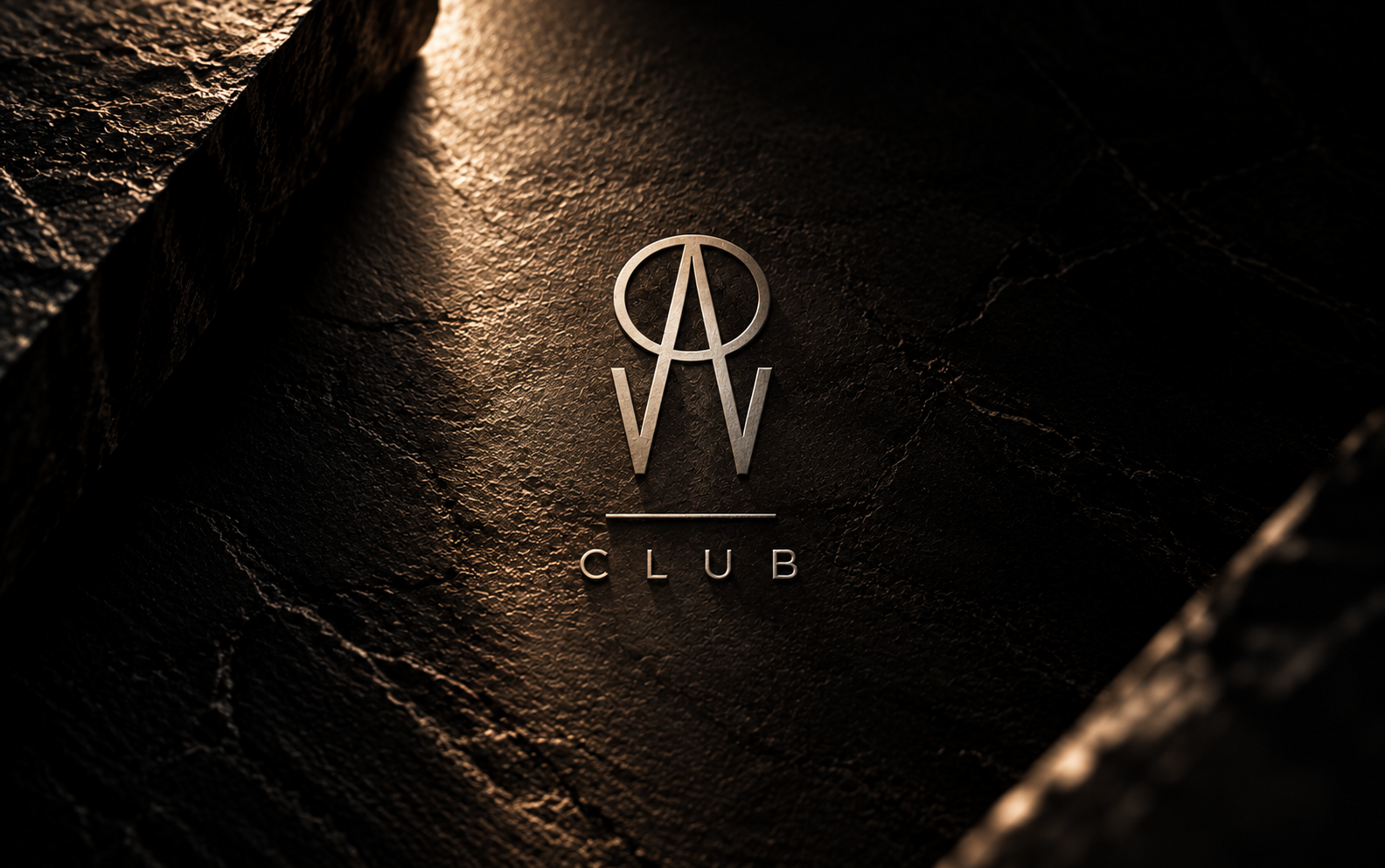 The PANOM Club emblem engraved in stone